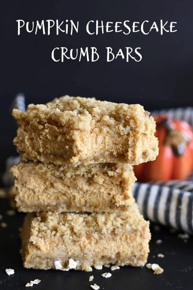 a stack of bar cookies with a pumpkin filling and crumb crust