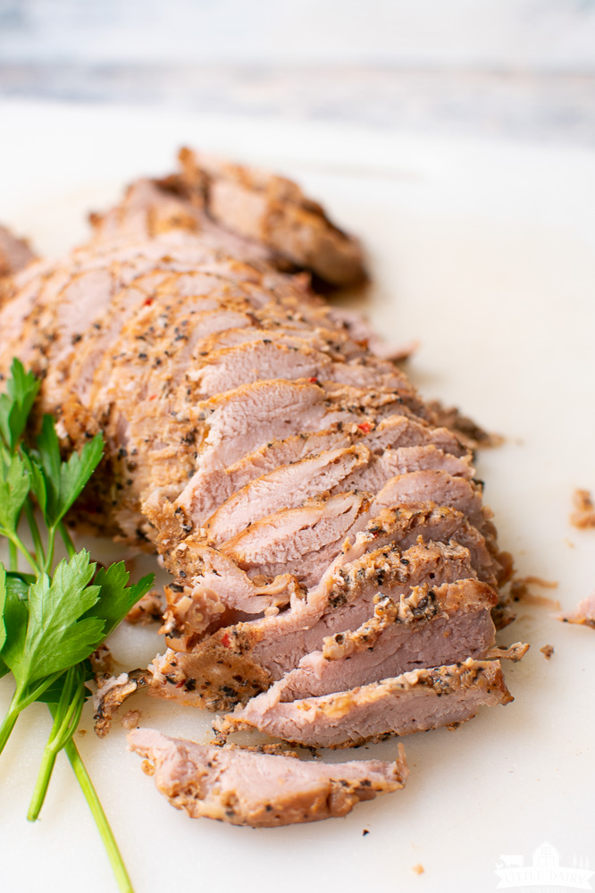 seasoned, cooked, and sliced pork tenderloin that was cooked in a pressure cooker