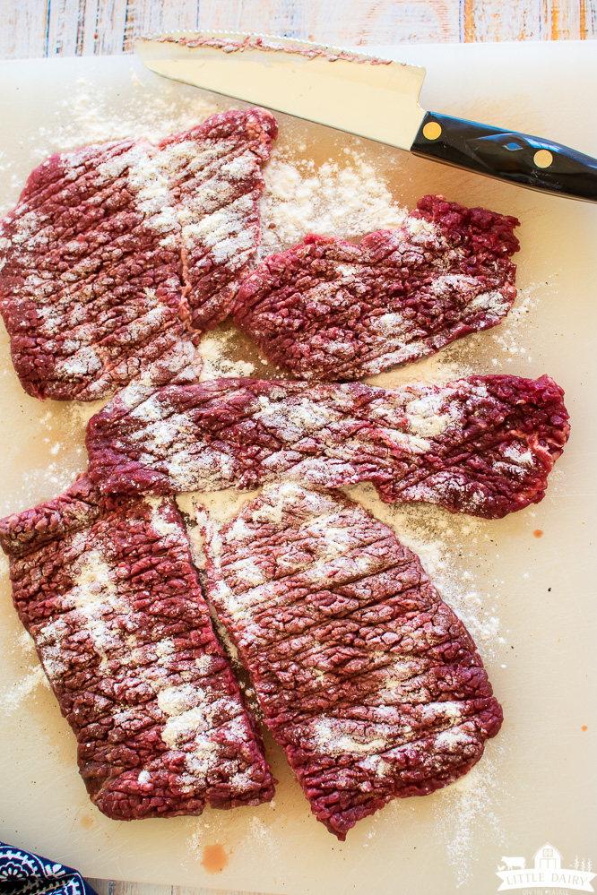 an image showing how to tenderize cube steaks with flour