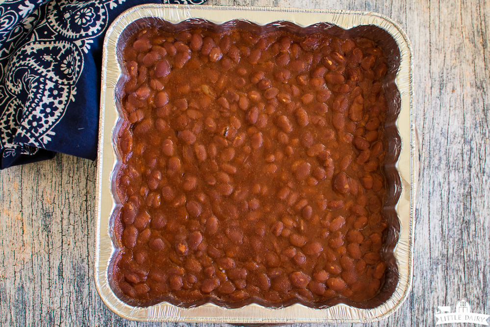 cooked baked beans in an aluminum pan