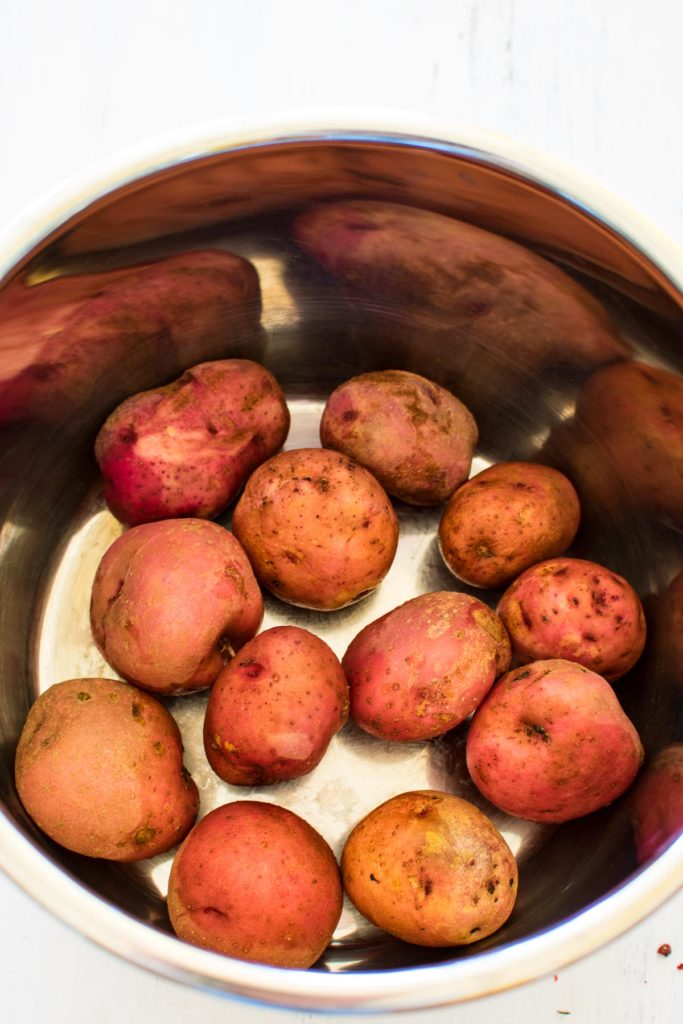 red potatoes in a pressure cooker.