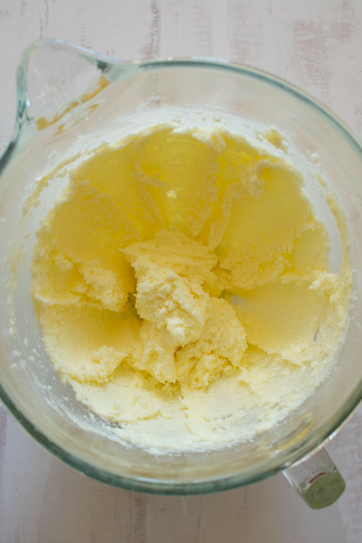 A mixing bowl with creamed butter.