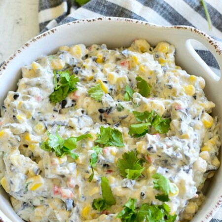 Veggie ranch dip with corn, beans, and herbs.