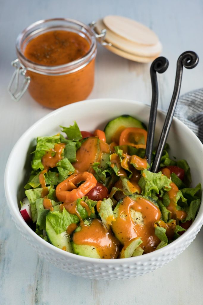 Green salad topped with French dressing.