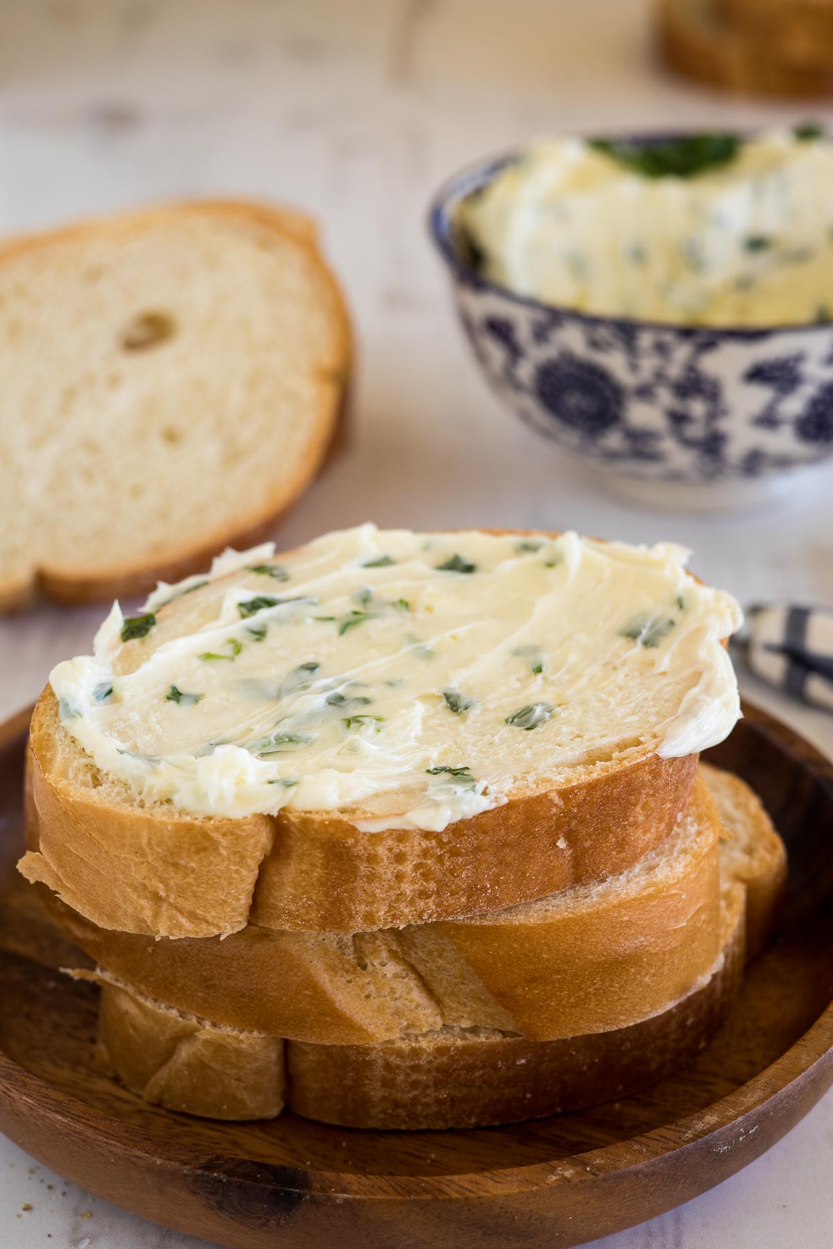 Bread with garlic herb butter on top.