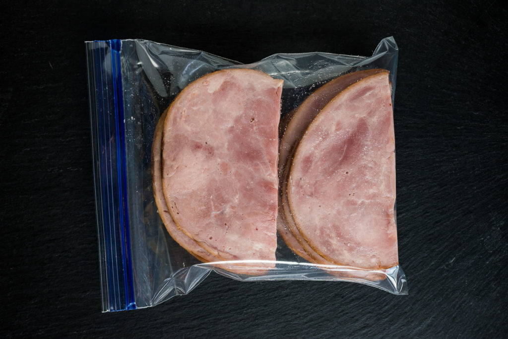 Sliced ham in a sealable bag to freeze.