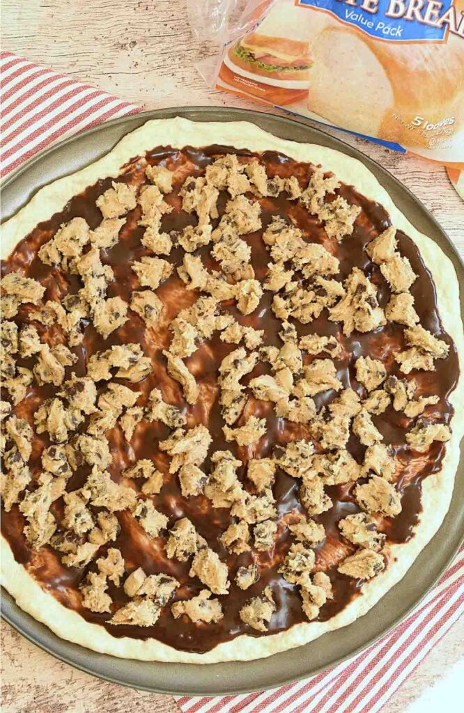Pizza with cookie dough on top.