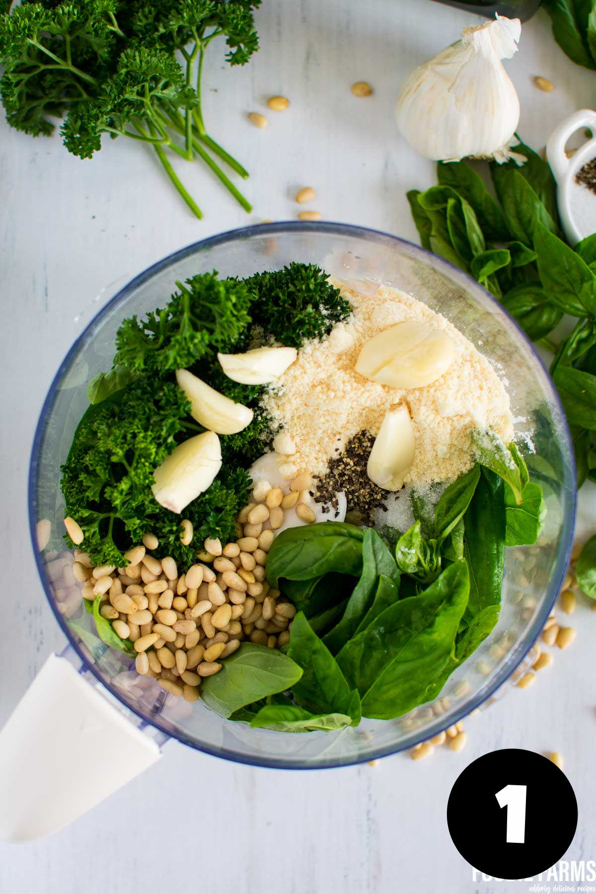 A food processor with whole ingredients.