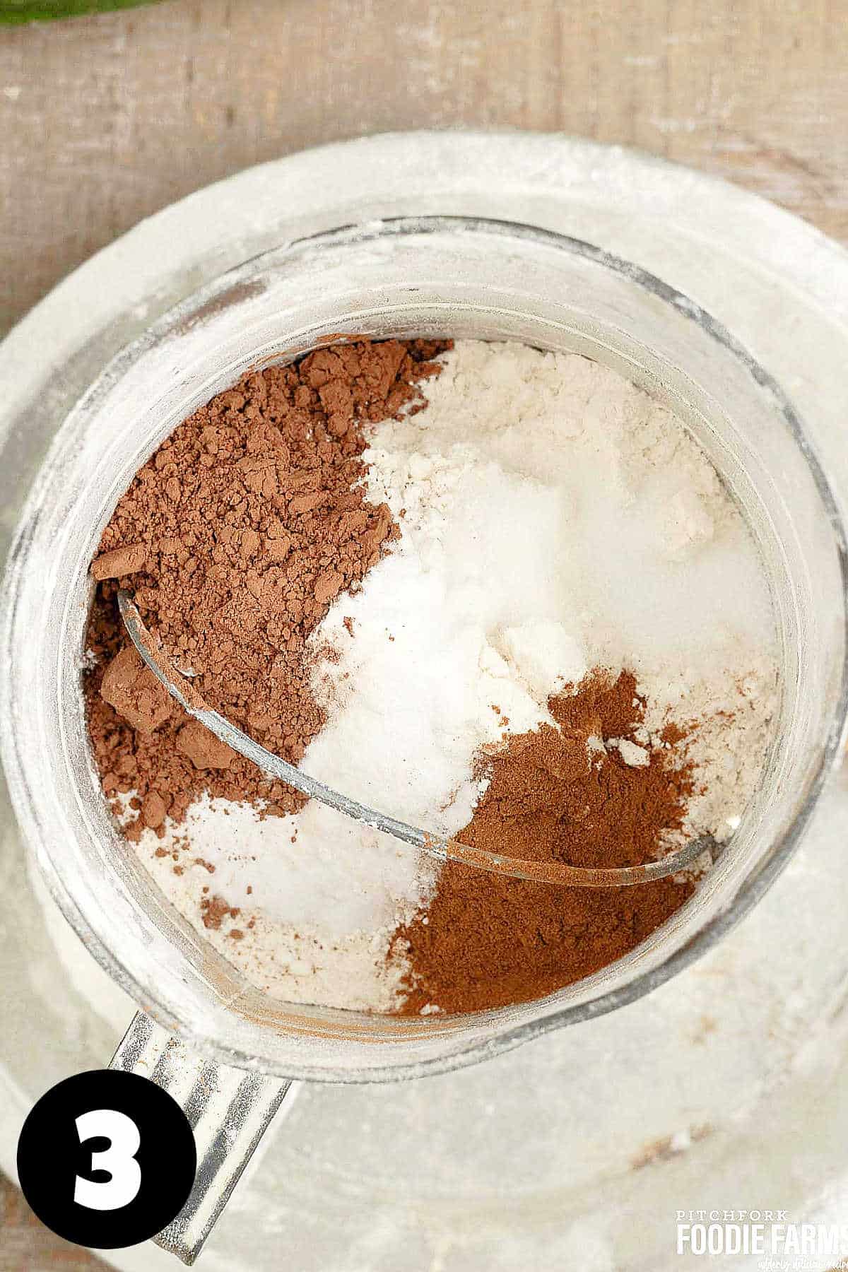 Flour, cocoa, cinnamon and other dry ingredients for making zucchini cake. 