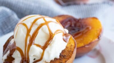 Peaches and ice cream with caramel sauce.