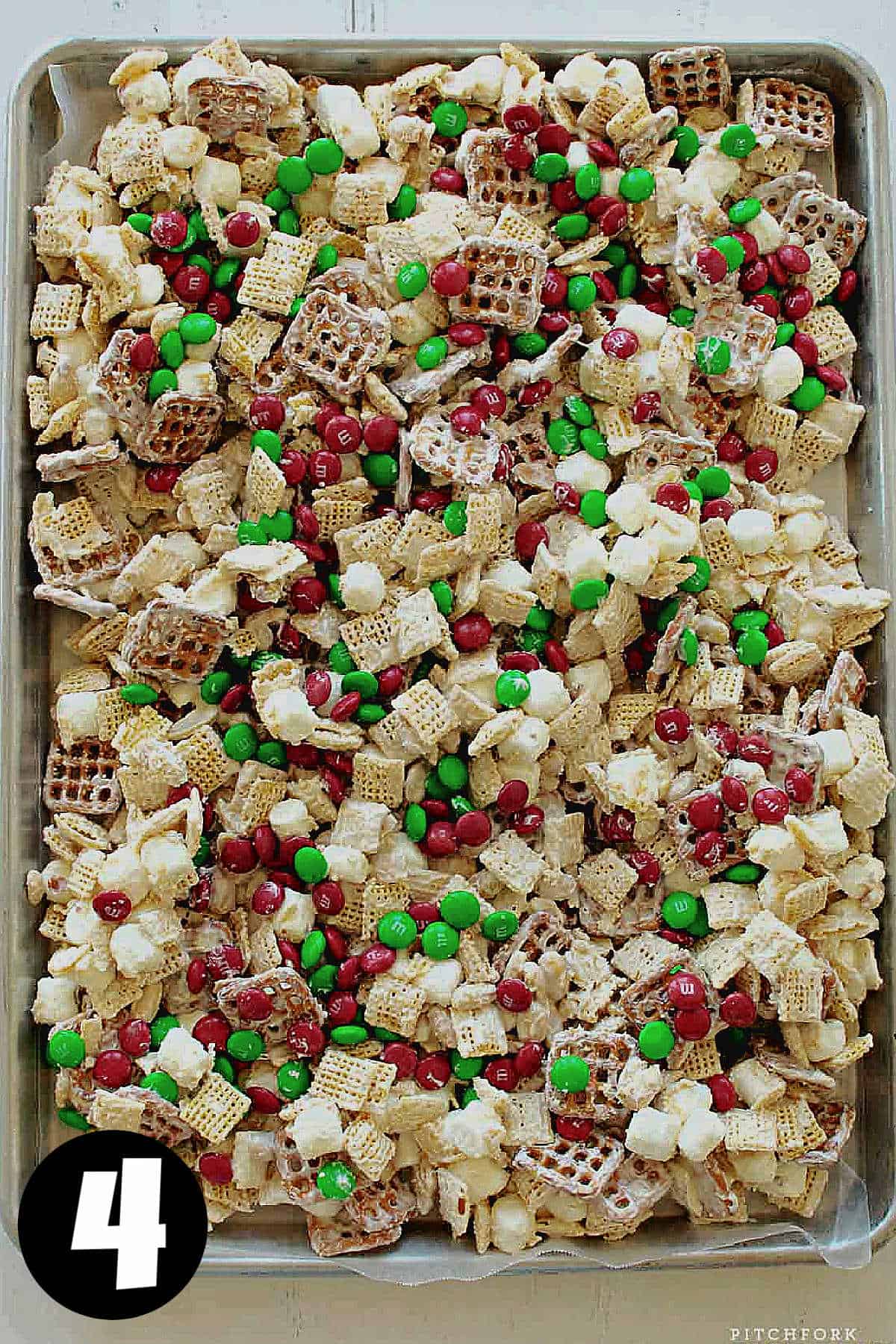 Christmas Crack Chex Mix with red and green M&Ms.