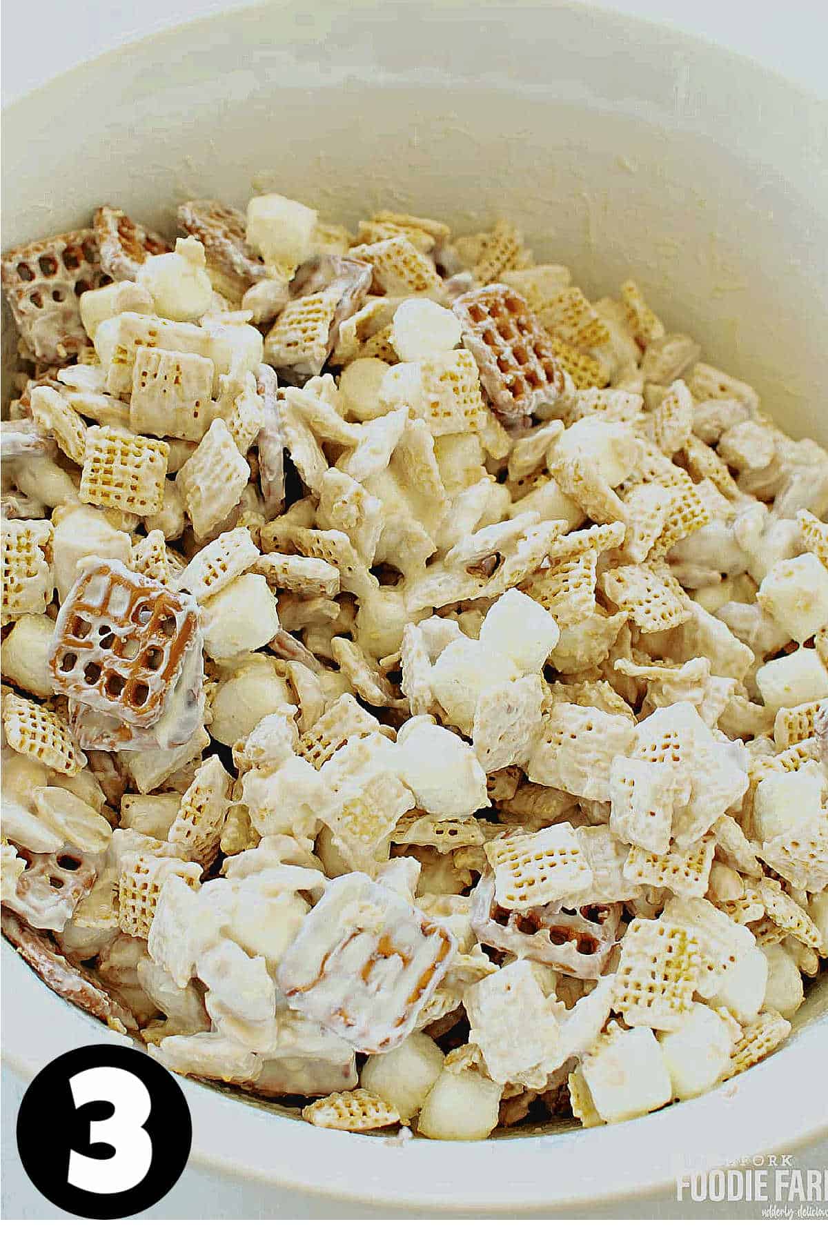 White chocolate Chex mix in a large bowl.