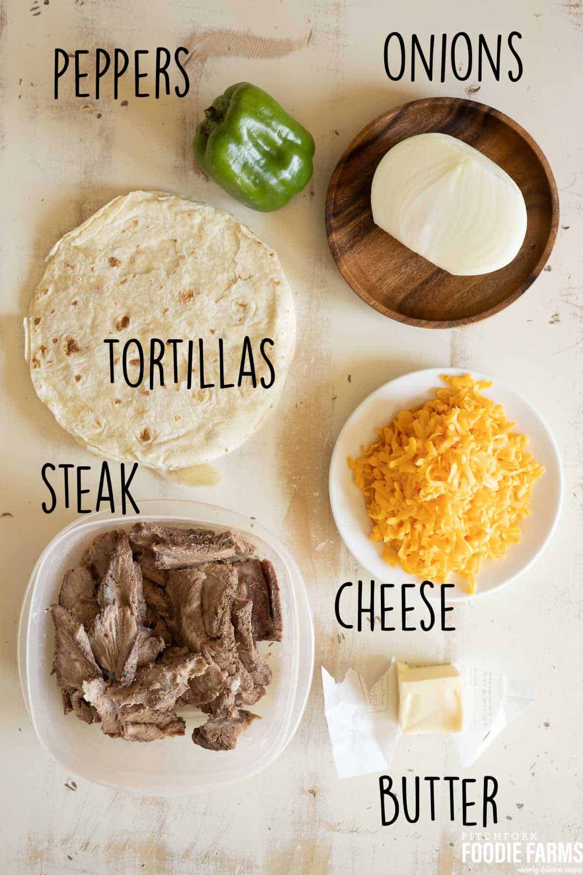Ingredients needed to make Philly Cheesesteak Quesadillas.