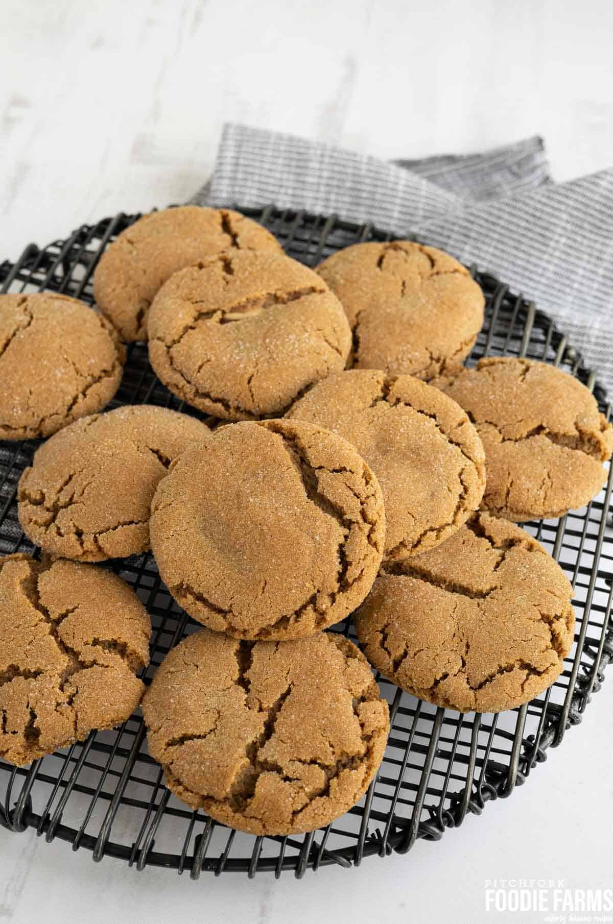 Gingersnap cookies on a cooling rack.