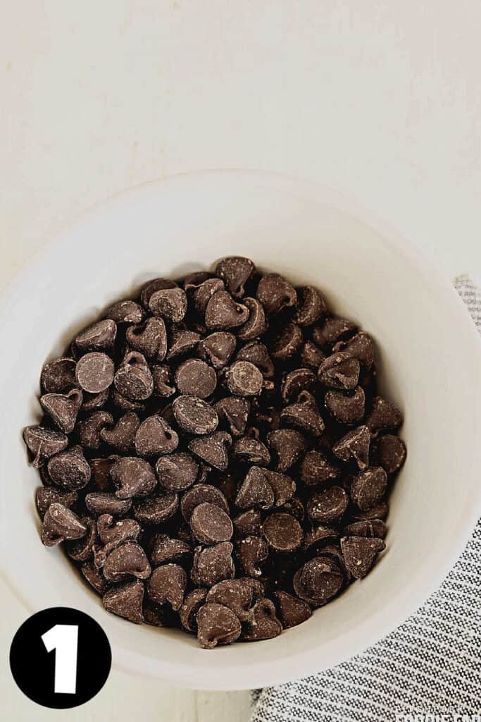 Chocolate chips in white mixing bowl.