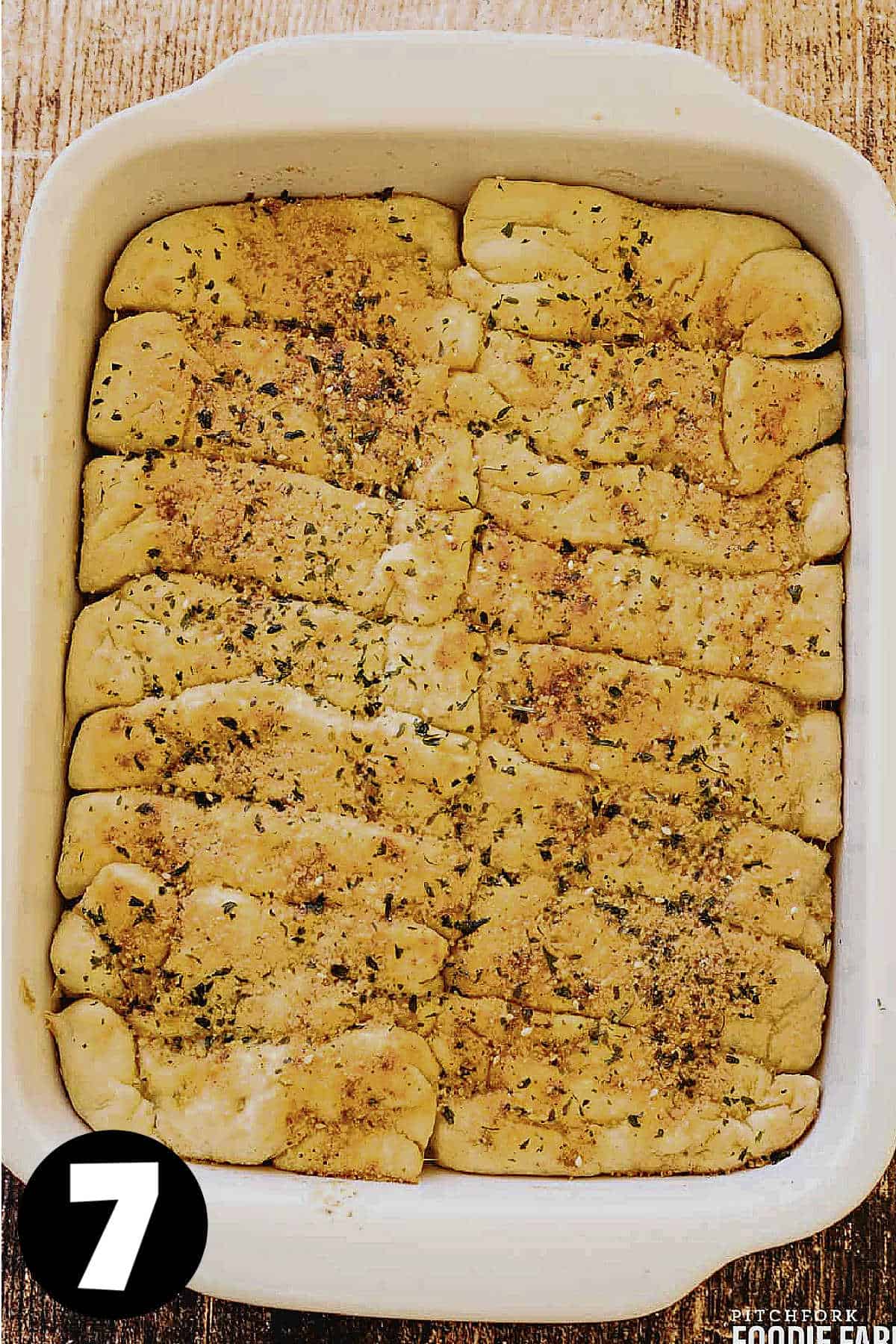 Baked cheesy breadsticks with garlic butter.