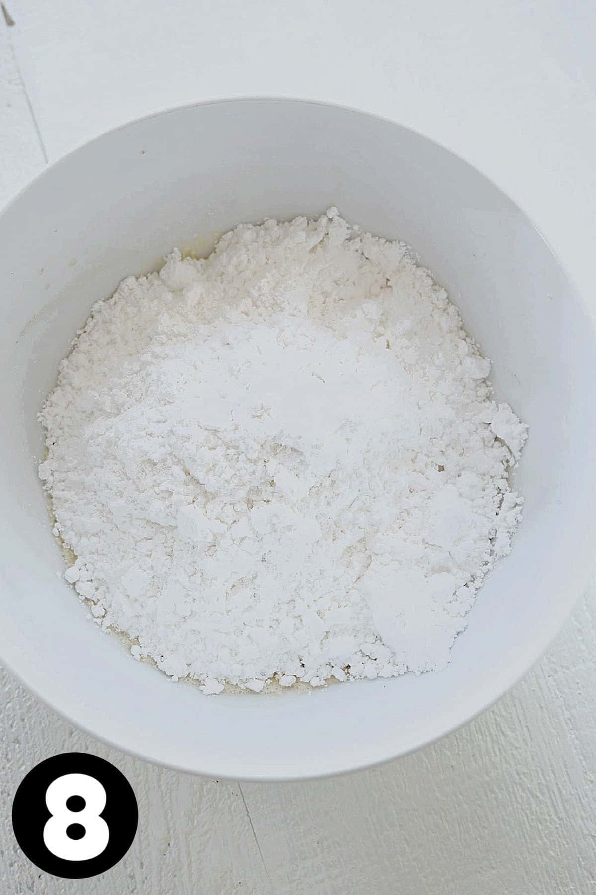 Powdered sugar in mixing bowl.