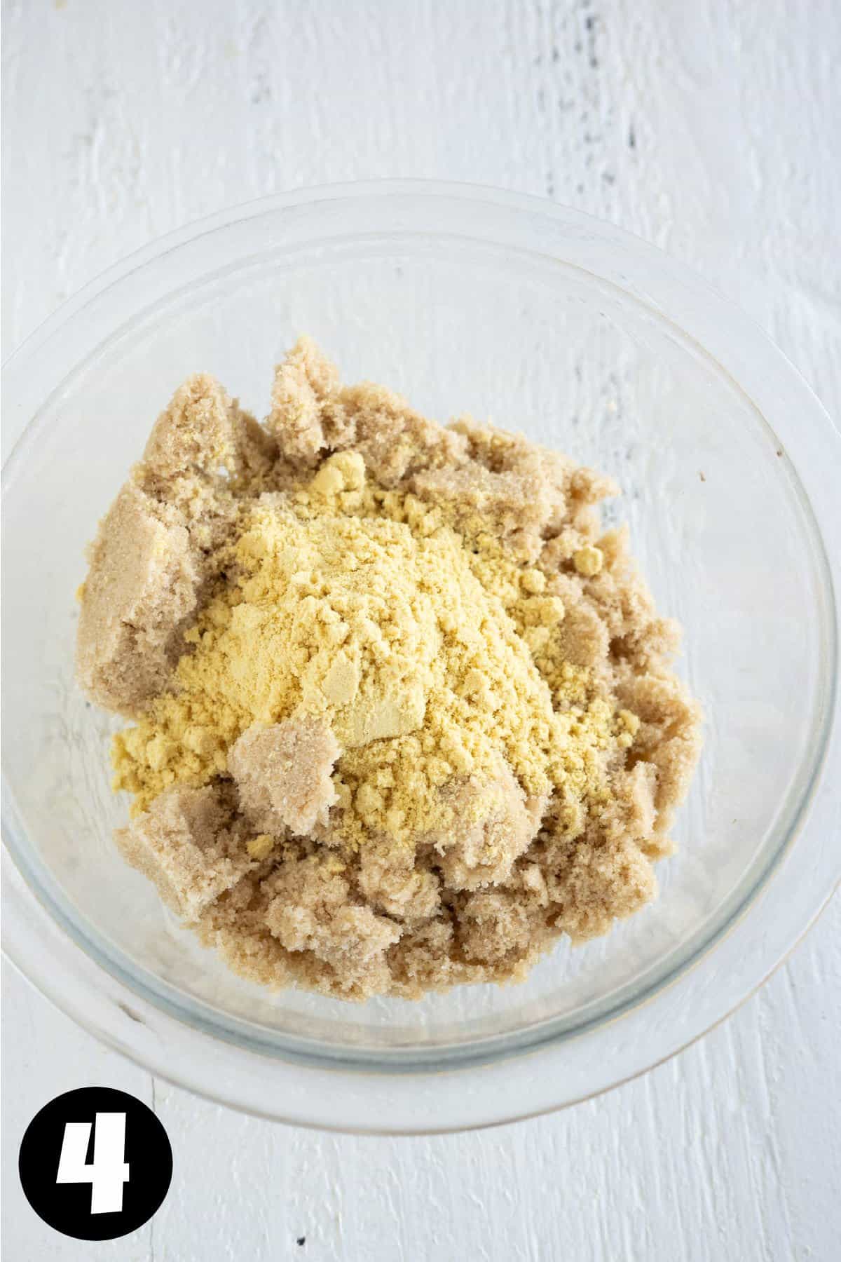 Brown sugar and mustard in a glass bowl.