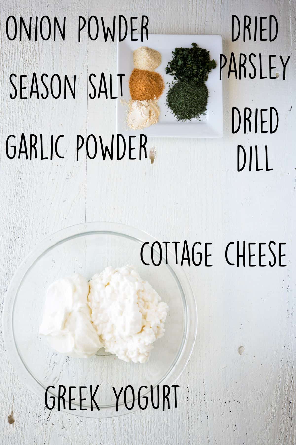 Season salt, garlic powder, onion powder, cottage cheese, Greek yogurt, parsley, and dill to make healthy veggie dip.