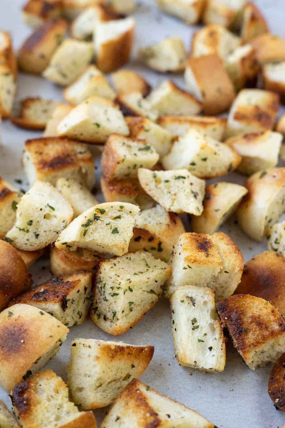 Baked garlic and butter croutons with herbs.