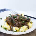 Tenderloin beef tips in a creamy mushroom sauce served on mashed potatoes.