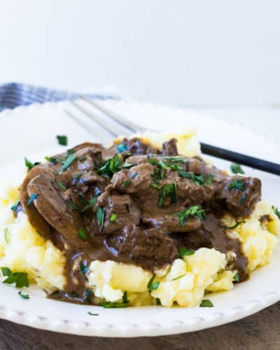 Tenderloin beef tips in a creamy mushroom sauce served on mashed potatoes.