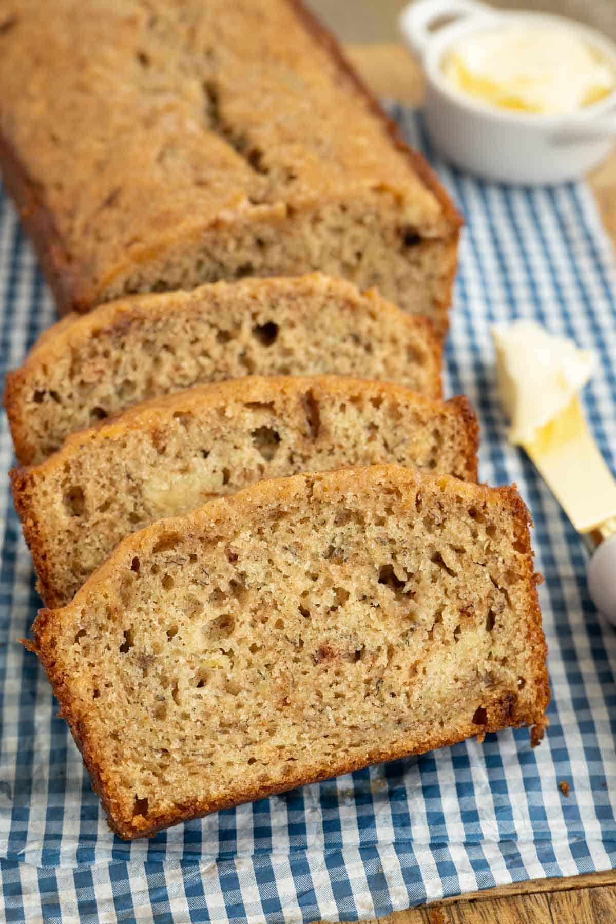 Slices of baked banana bread with Greek yogurt.