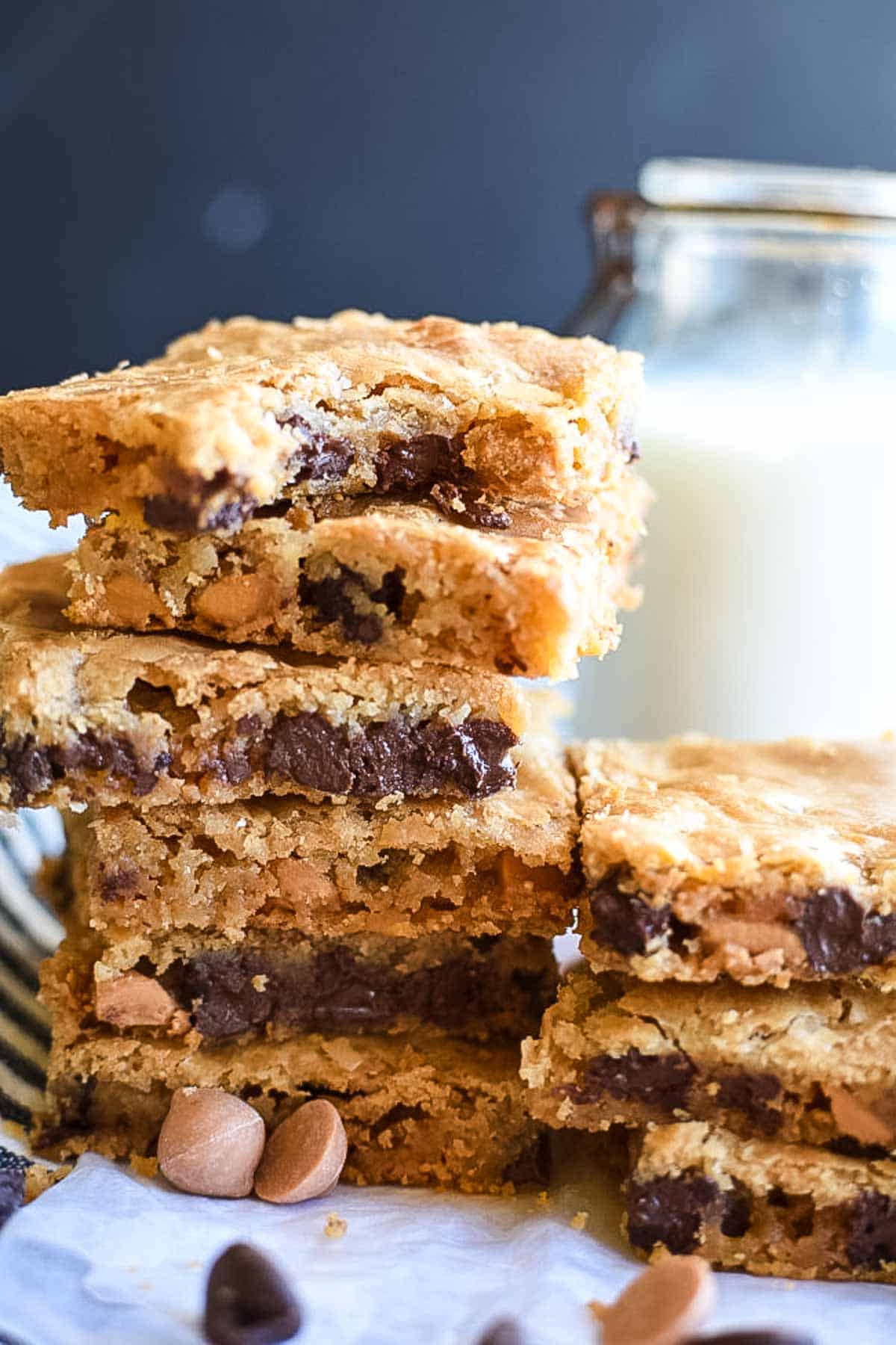 A stack of bar cookies with butterscotch and chocolate chips.
