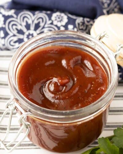 A jar of barbecue sauce that's sweet and tangy.
