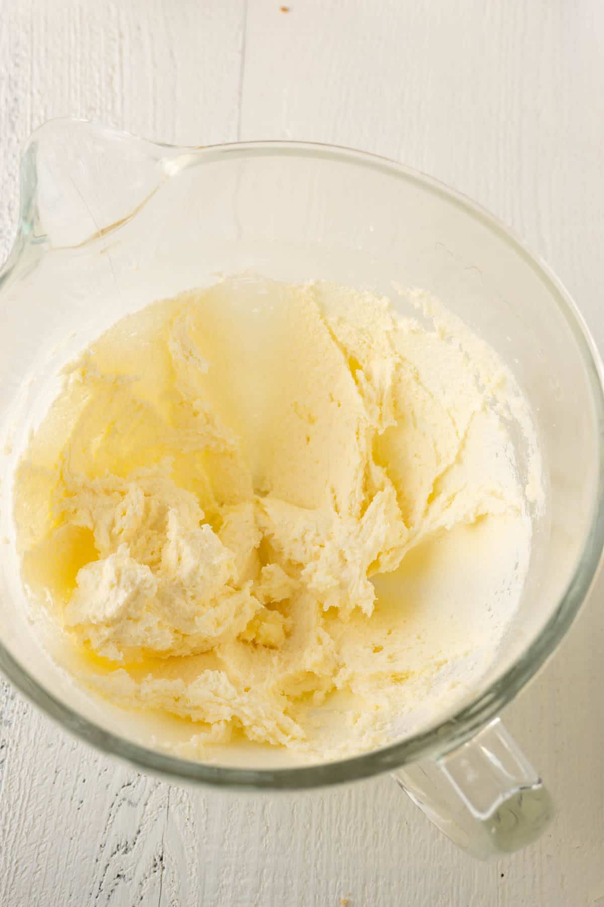 Creamed butter and sugar in a mixing bowl.