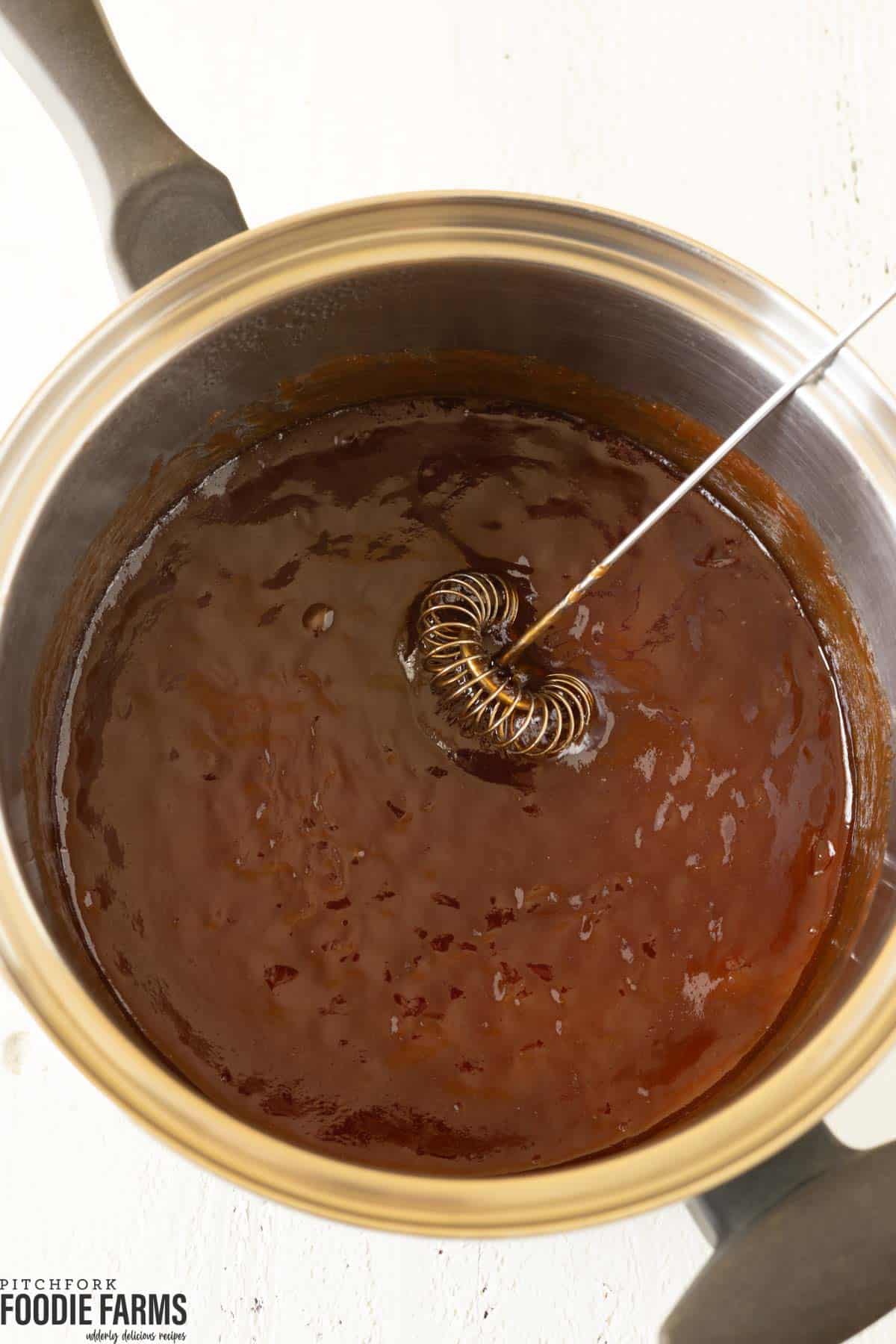 Homemade bbq glaze for meatloaf in a saucepan.