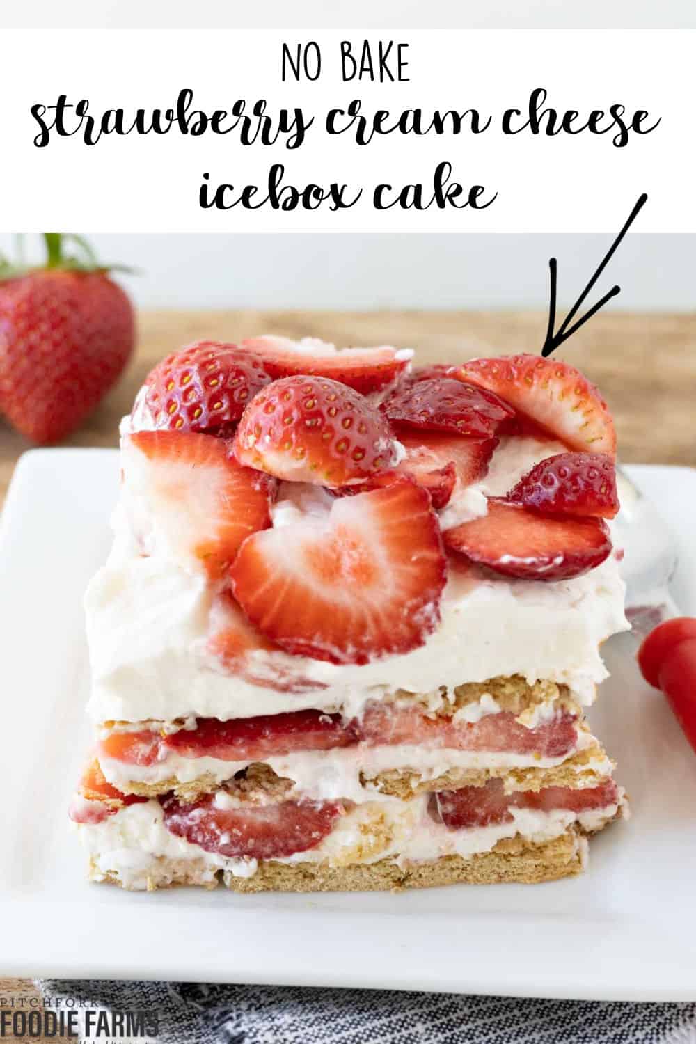 A piece of strawberry cream cheese icebox cake with a text overlay.