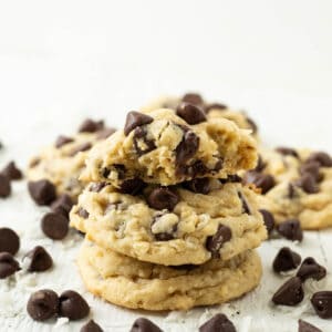 A stack of chocolate chip cookies with coconut.