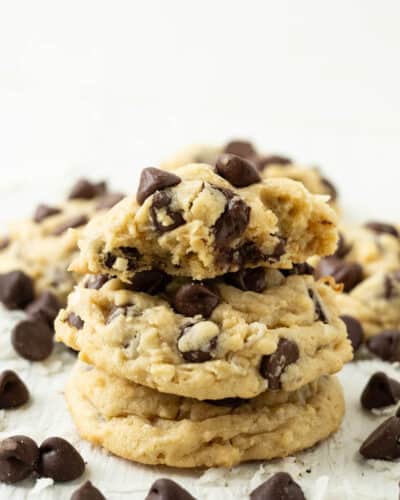 A stack of chocolate chip cookies with coconut.